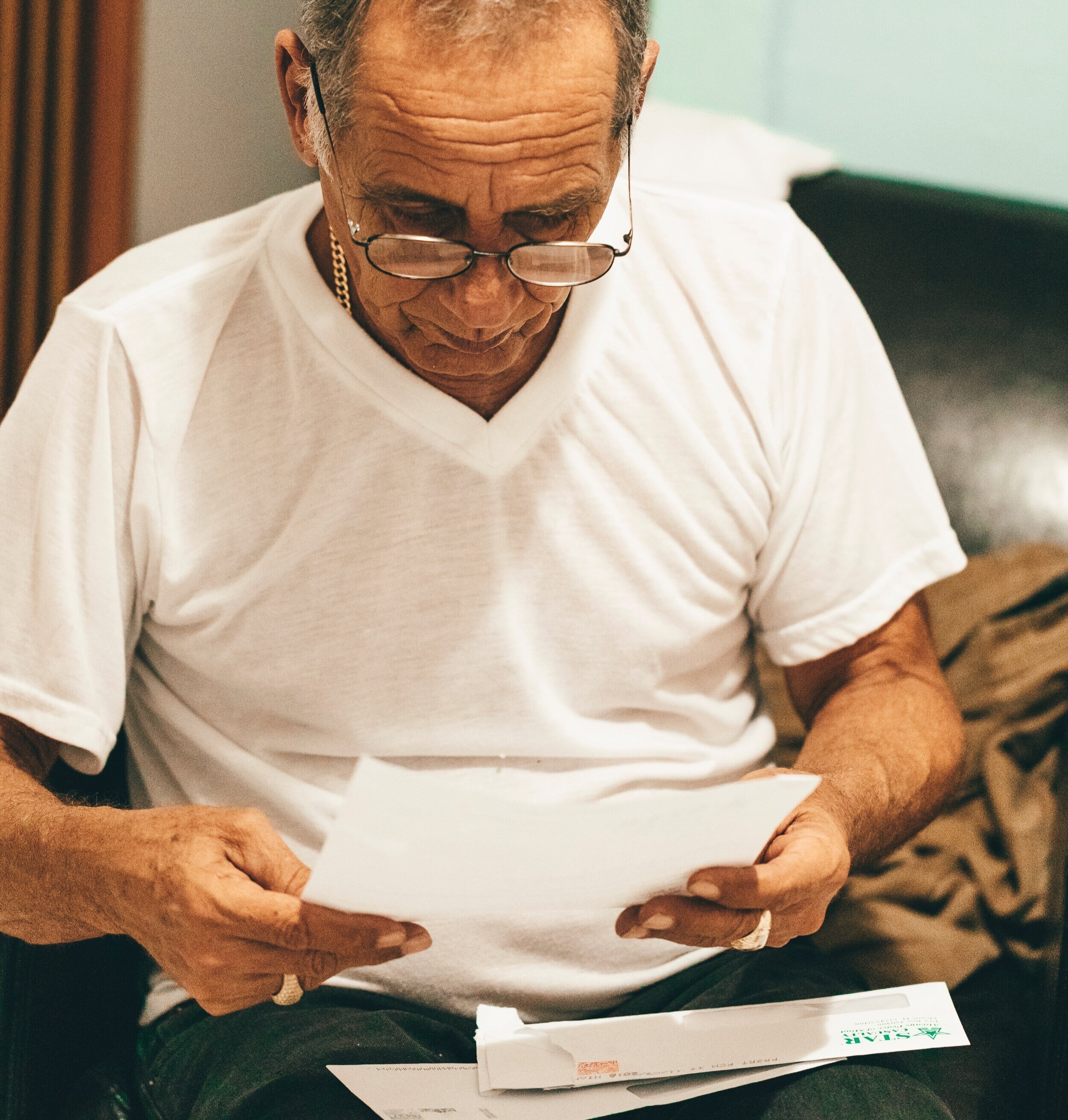 photo-of-old-man-reading-paper-3018526.jpg